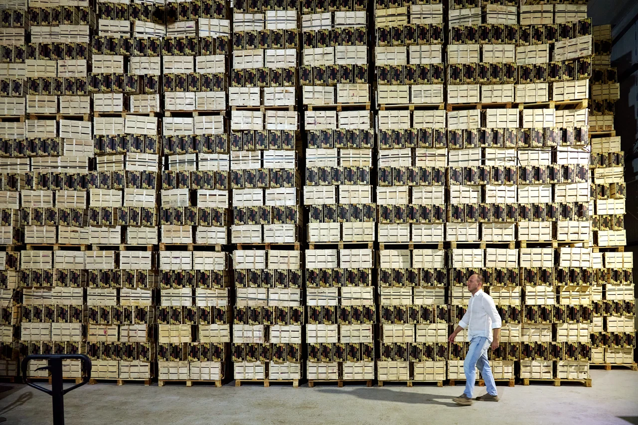 Tall stacks of harvest crates in the warehouse
